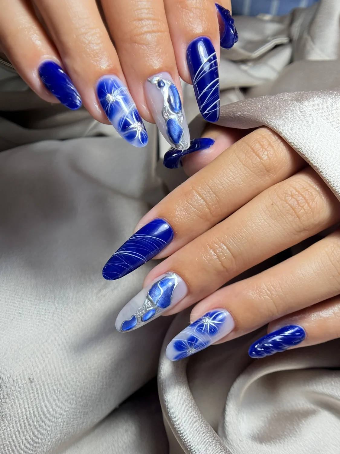 Blue artistic manicure